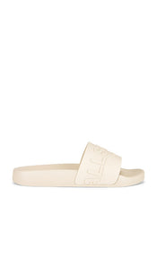 ALLSAINTS Biggy Slider in White | Chalk White Flat Sandals for Women