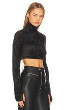 The Andamane Orchid Turtleneck Crop Top in Black