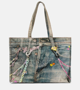 Acne Studios Large denim-effect printed canvas shopper. Shop Acne Studios Tote Bags for women now.