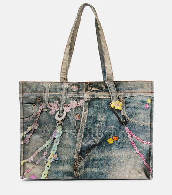 Acne Studios Large denim-effect printed canvas shopper. Shop Acne Studios Tote Bags for women now.