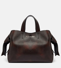 Acne Studios Musubi Midi leather tote bag. Shop Acne Studios Tote Bags for women now.