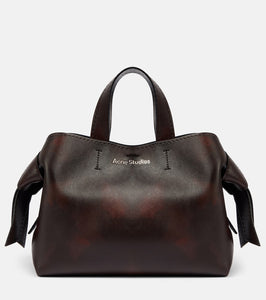 Acne Studios Musubi Midi leather tote bag. Shop Acne Studios Tote Bags for women now.