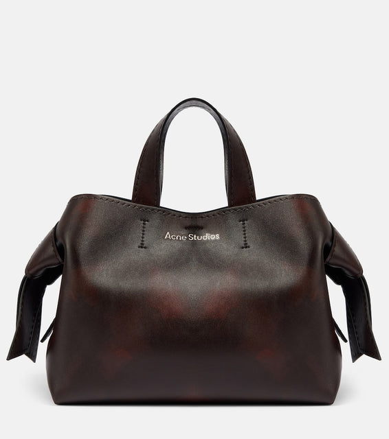 Acne Studios Musubi Midi leather tote bag. Shop Acne Studios Tote Bags for women now.