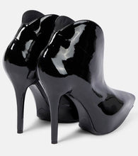 Alaia Booties Slick patent leather ankle boots