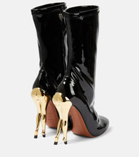 Alaia Cabaret mid-calf boots