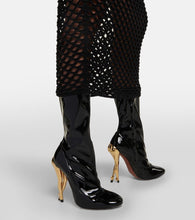 Alaia Cabaret mid-calf boots