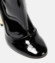 Alaia Cabaret mid-calf boots