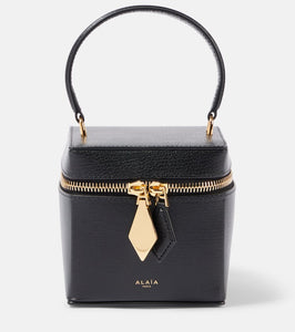 Alaia Cube leather vanity bag. Shop Alaia Top-Handle Bags for women now.