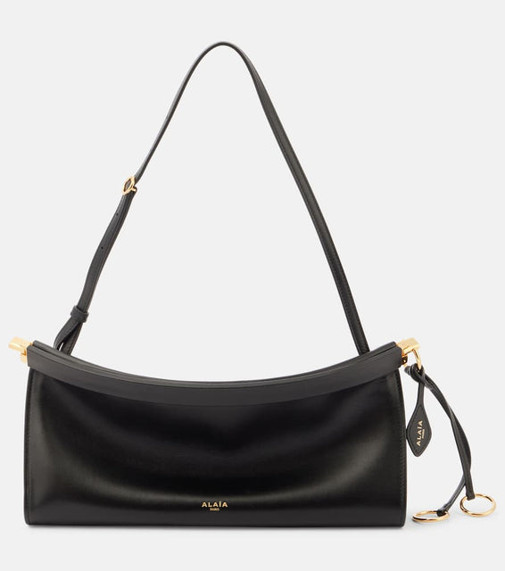 Alaia Curve Medium leather shoulder bag. Shop Alaia Shoulder Bags for women now.