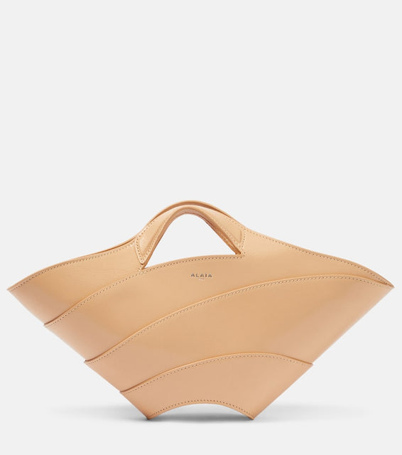 Alaia Khaima Small leather tote bag. Shop Alaia Top-Handle Bags for women now.