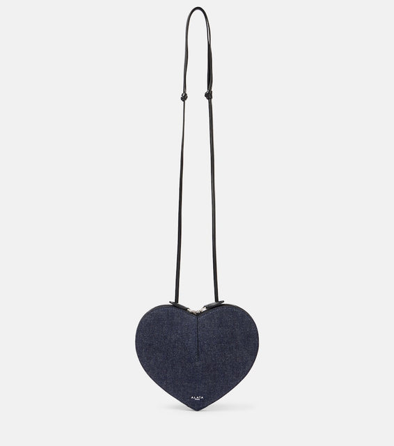 Alaia Le C√Ö¬ìur denim shoulder bag. Shop Alaia Crossbody Bags for women now.