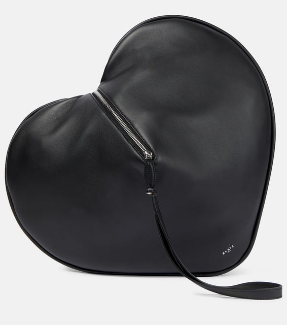 Alaia Le C√Ö¬ìur leather clutch. Shop Alaia Clutches for women now.