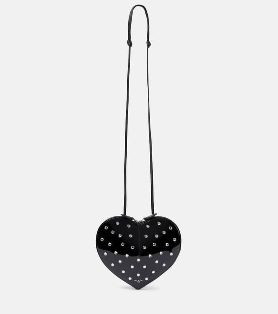 Alaia Le C√Ö¬ìur studded leather crossbody bag. Shop Alaia Shoulder Bags for women now.