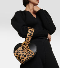 Alaia Le Cache C√Ö¬ìur calf hair and leather clutch