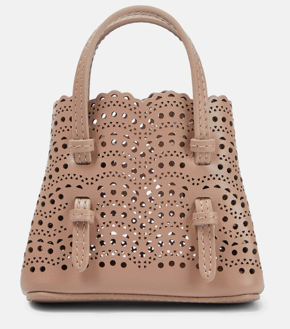 Alaia Le Mina Mini leather crossbody bag. Shop Alaia Top-Handle Bags for women now.