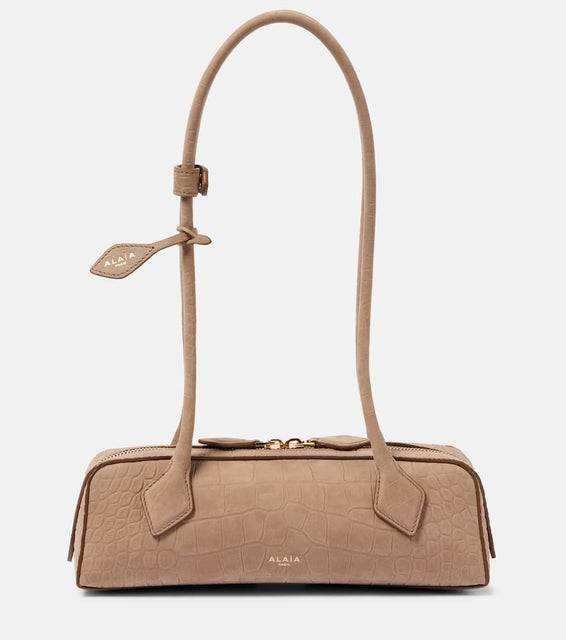 Alaia Le Teckel Small croc-effect shoulder bag. Shop Alaia Shoulder Bags for women now.
