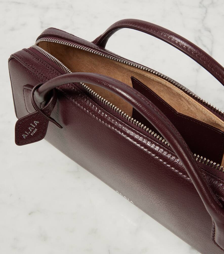 Alaia Le Teckel leather clutch