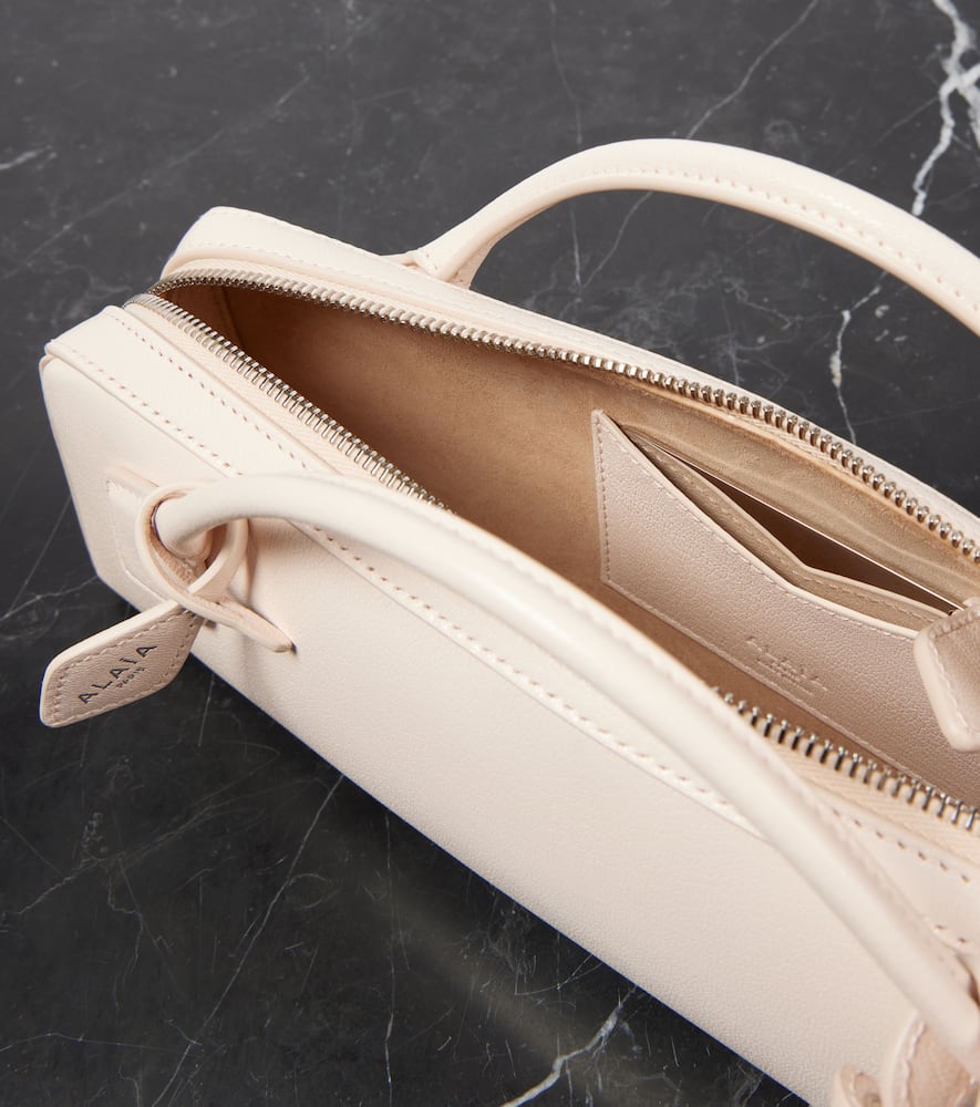 Alaia Le Teckel leather clutch
