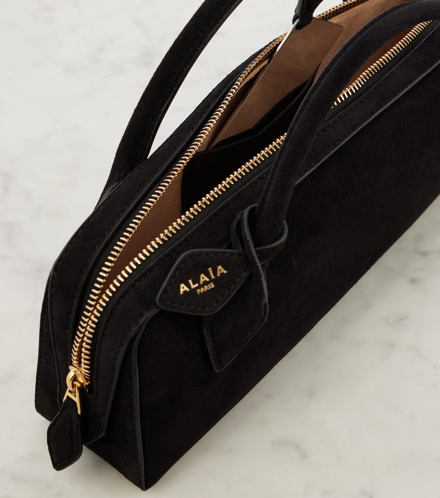 Alaia Le Teckel leather clutch