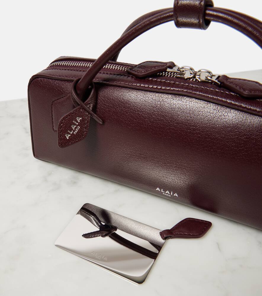 Alaia Le Teckel leather clutch