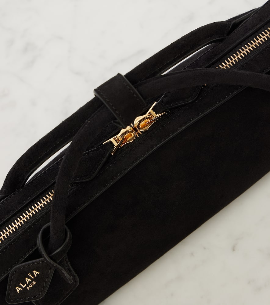 Alaia Le Teckel leather clutch