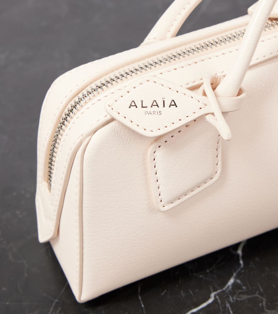 Alaia Le Teckel leather clutch