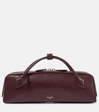 Alaia Le Teckel leather clutch. Shop Alaia Top-Handle Bags for women now.