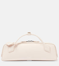 Alaia Le Teckel leather clutch. Shop Alaia Top-Handle Bags for women now.