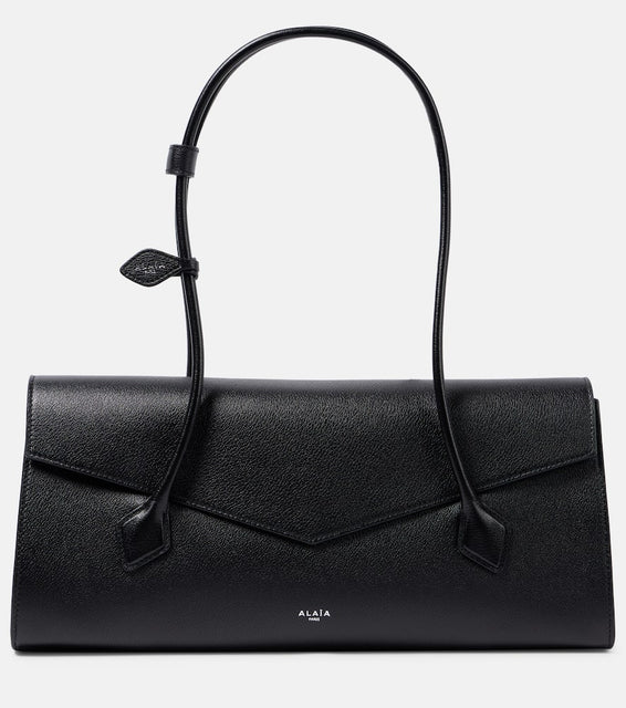 Alaia Le Teckel leather shoulder bag. Shop Alaia Shoulder Bags for women now.