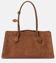 Alaia Le Teckel suede tote bag. Shop Alaia Shoulder Bags for women now.