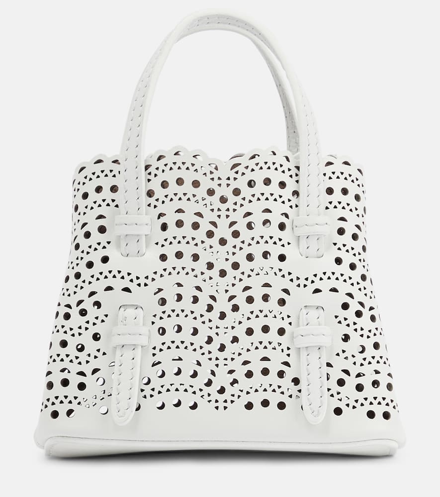 Alaia Mina Mini leather crossbody bag. Shop Alaia Top-Handle Bags for women now.