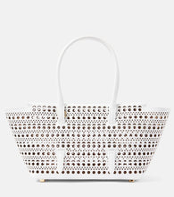 Alaia New Mina 20 leather shoulder bag. Shop Alaia Top-Handle Bags for women now.