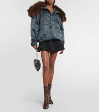 Alaia Oversized faux fur-trimmed parka