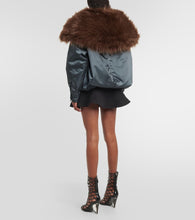 Alaia Oversized faux fur-trimmed parka