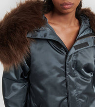 Alaia Oversized faux fur-trimmed parka