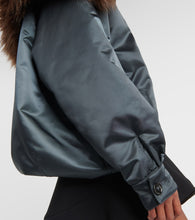 Alaia Oversized faux fur-trimmed parka