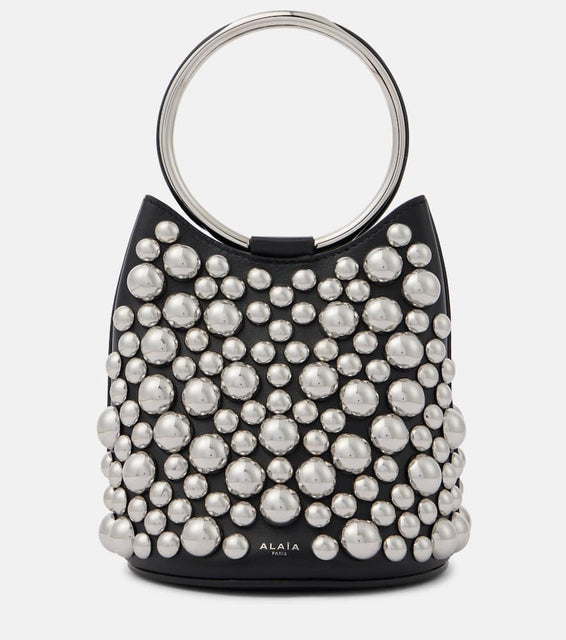 Alaia Ring Mini embellished leather bucket bag. Shop Alaia Top-Handle Bags for women now.