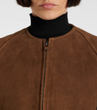 Alaia Shearling-trimmed suede jacket