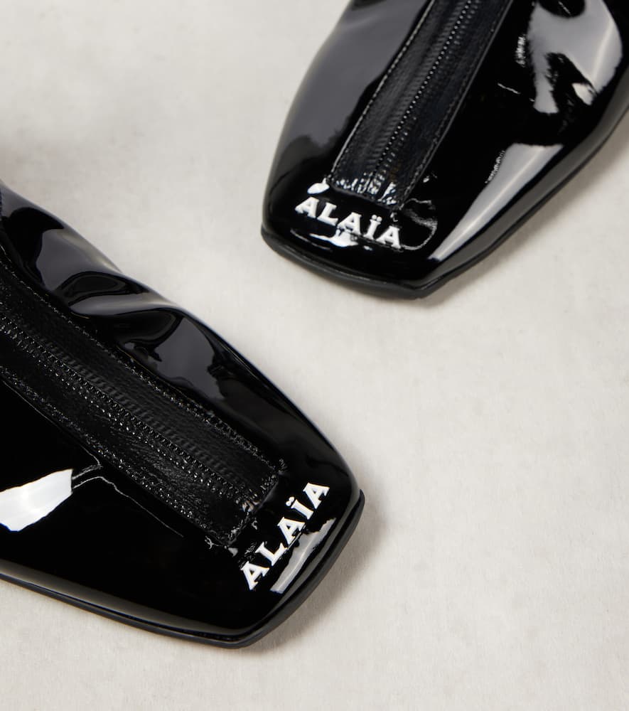 Alaia Sneaker faux patent leather ankle boots