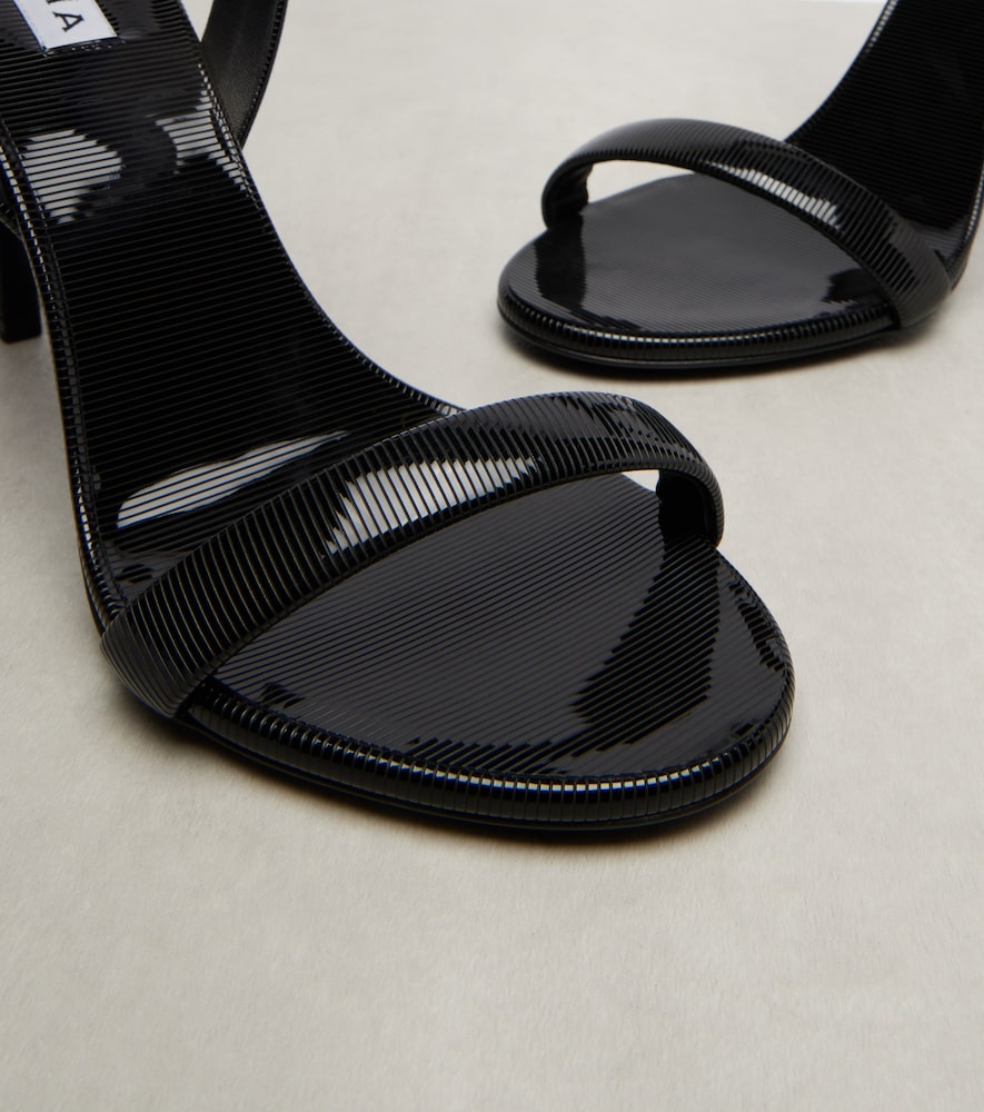 Alaia Chain trompe loeil patent leather sandals in Black - Heeled Sandals