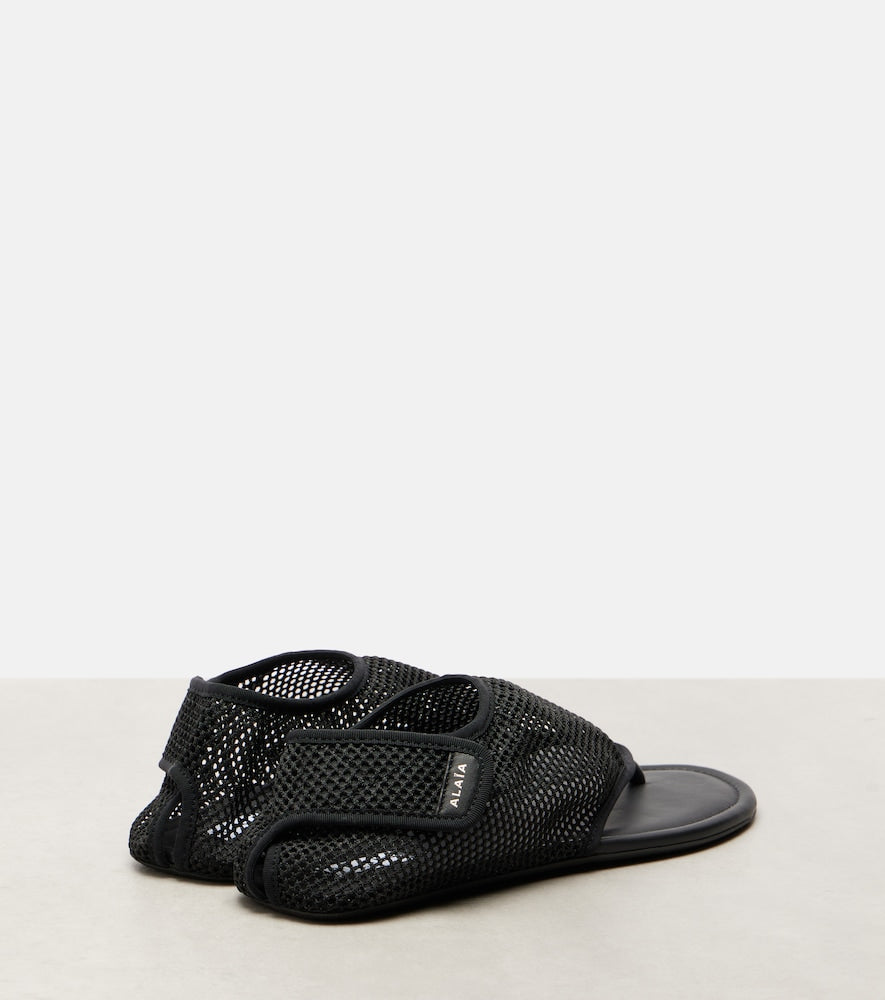 Alaia Fishnet thong sandals - Black Flat Sandals