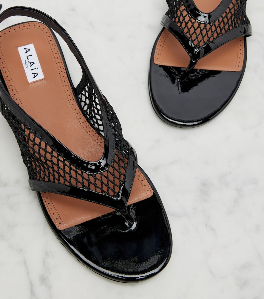 Black Alaia Leather-trimmed fishnet thong sandals - Flat Sandals