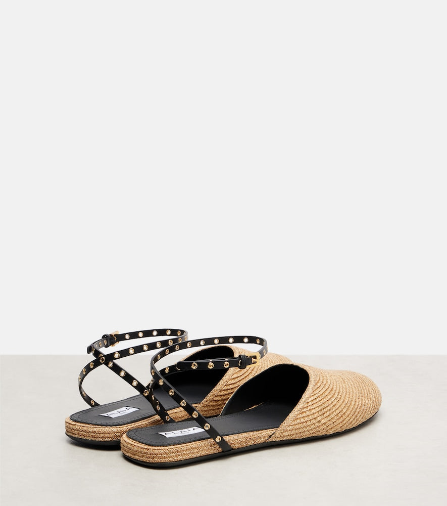 Alaia Leather-trimmed raffia flats (Neutrals) - Mules