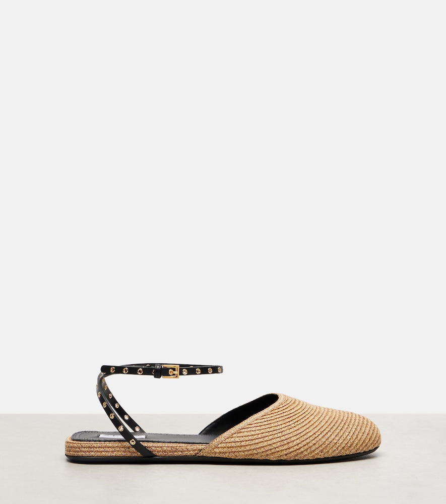 Alaia Leather-trimmed raffia flats (Neutrals) - Mules