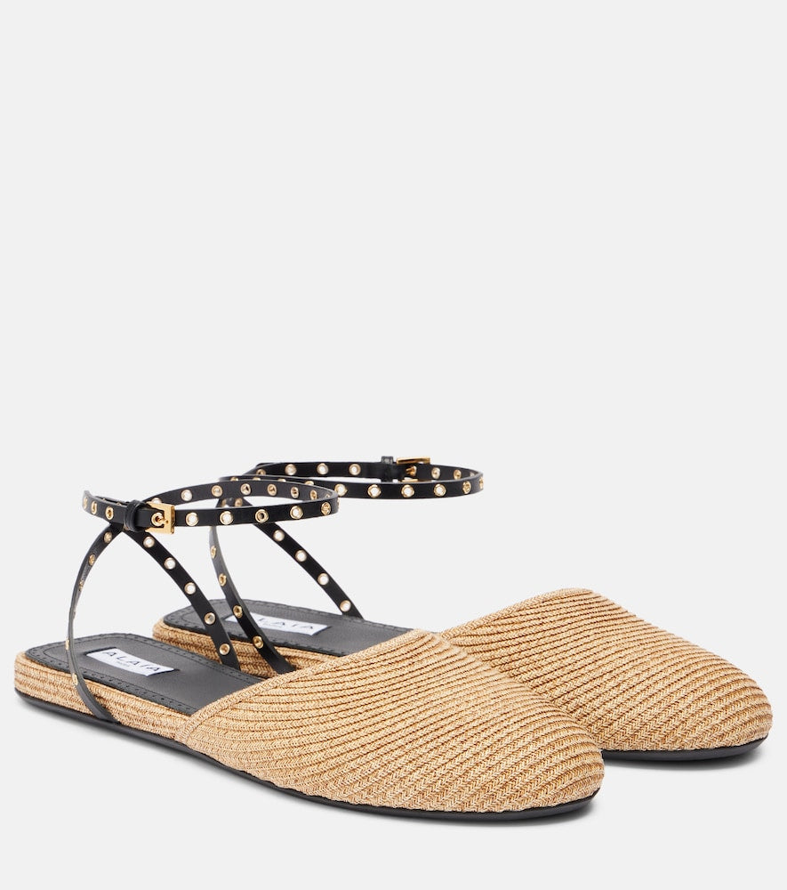 Alaia Leather-trimmed raffia flats (Neutrals) - Mules