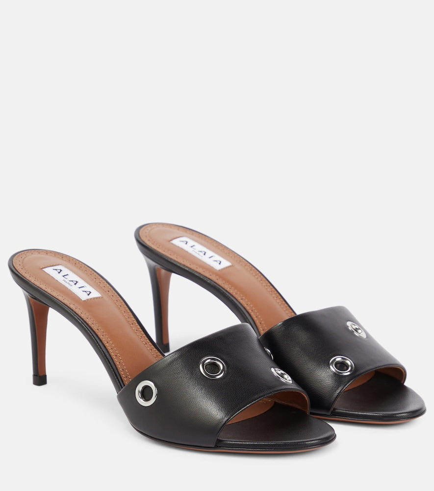 Alaia Oeillets embellished leather sandals (Black) - Mid Heel Sandals