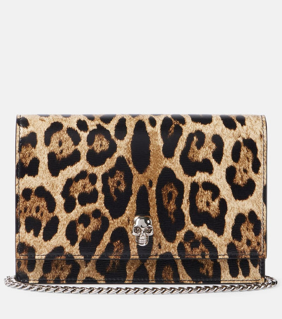 Alexander McQueen Skull Small animal-print crossbody bag. Shop Alexander McQueen Clutches for women now.