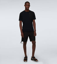 And Wander and wander x Salomon CROSS sandals
