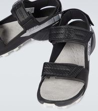 And Wander and wander x Salomon CROSS sandals