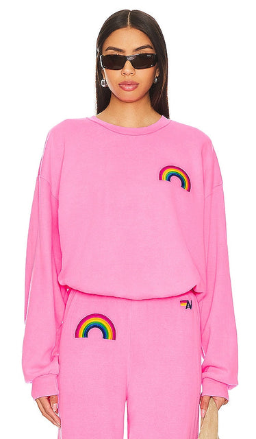 Aviator Nation Rainbow Embroidery Crew Neck Sweatshirt in Pink - Aviator Nation - Sweat ras du cou brodé arc-en-ciel en rose - Aviator Nation 粉色彩虹刺绣圆领运动衫 - Aviator Nation Sweatshirt mit Rundhalsausschnitt und Regenbogenstickerei in Rosa - Aviator Nation 레인보우 자수 크루넥 스웨트셔츠 핑크 색상 - Felpa girocollo con ricamo arcobaleno Aviator Nation in rosa